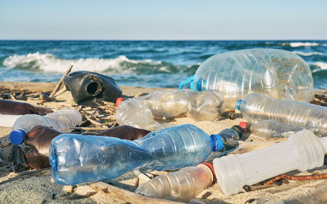 Plastic bottles littering a beach