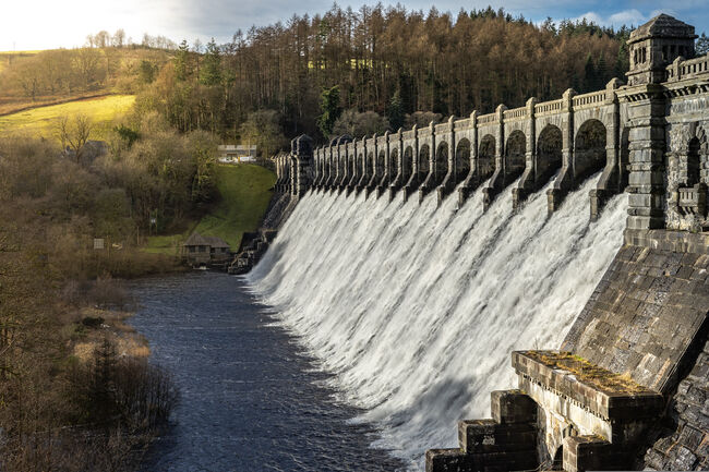 Water falling over a reservoir in Wales
