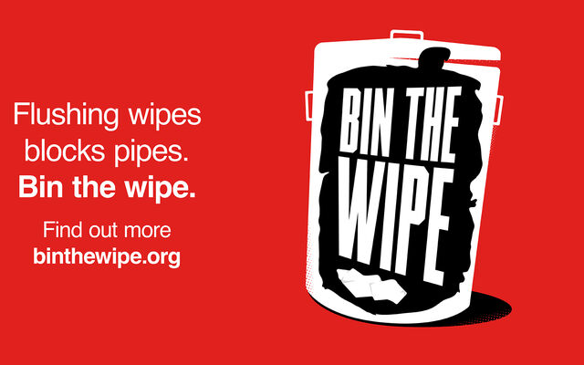 A white bin with a black bin bag with the words 'bin the wipe' in bold all against a red background
