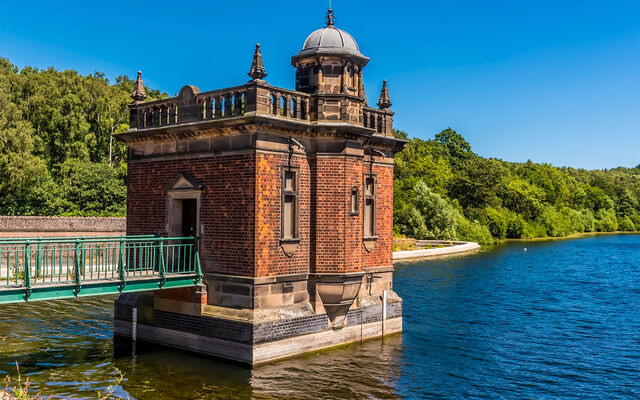 Old fashioned brick building at a reservoir