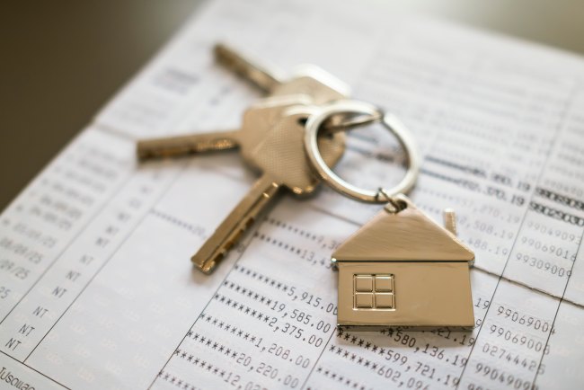 Keys on top of a financial document